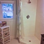 Our finished bath with my special shower curtain rod