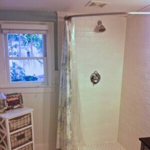 Our finished bath with my special shower curtain rod